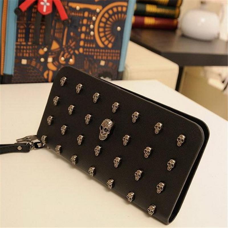 Leather Wristlet Handbag with Metal Skull Design