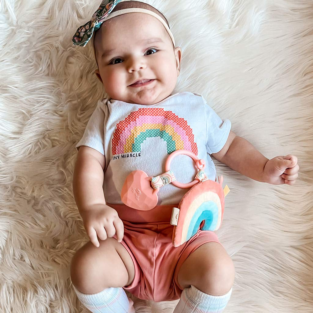 Infant Toy & Teether - Itzy Pal Baby Teething Toy Includes Lovey, Crinkle Sound, Textured Ribbons & Silicone Teether for Newborn (Rainbow)