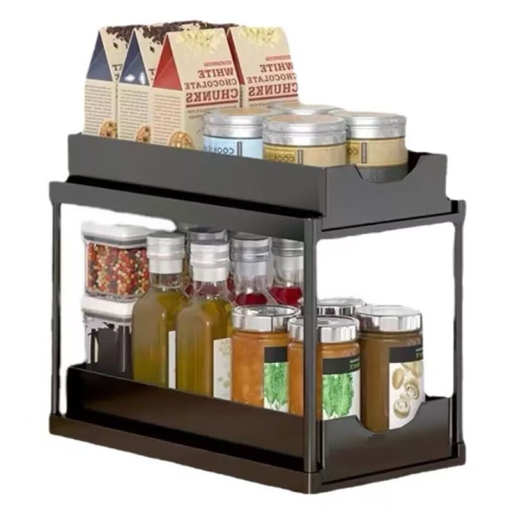 Two-tier pull-out storage rack. An organizational lifesaver for under the kitchen sink. Features adjustable shelves for easy storage of bottles and...