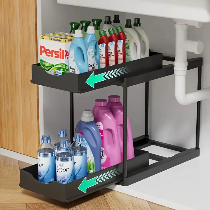 Two-tier pull-out storage rack. An organizational lifesaver for under the kitchen sink. Features adjustable shelves for easy storage of bottles and...
