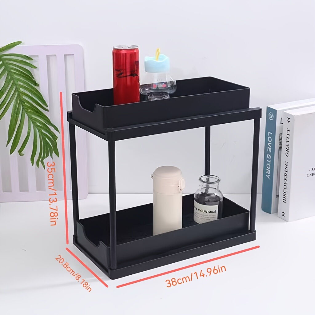 Two-tier pull-out storage rack. An organizational lifesaver for under the kitchen sink. Features adjustable shelves for easy storage of bottles and...