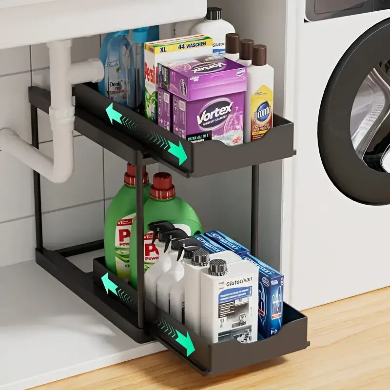 Two-tier pull-out storage rack. An organizational lifesaver for under the kitchen sink. Features adjustable shelves for easy storage of bottles and...